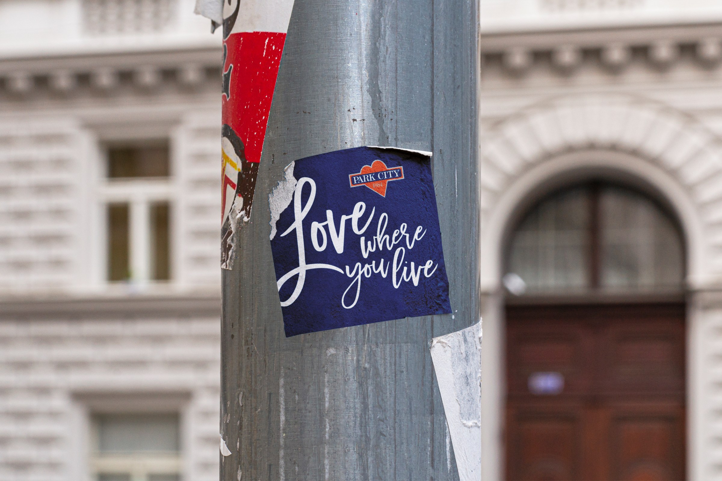 Love where you live sticker with Park City heart mark on a utility pole